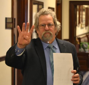 Rep. David Guttenberg, D-Fairbanks, flashes the symbol of support for the Fairbanks Four. (Photo courtesy Alaska Independent Democratic Coalition)