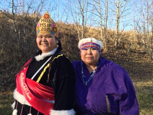 Ashley Doctolero and her mother Ada Coyle pose in their traditional regalia. Doctolero sewed her own clothes. (Hillman/KSKA)