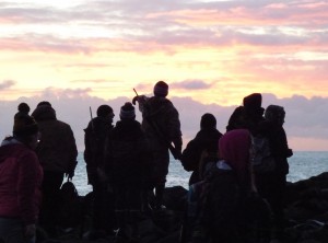 Students and mentors look for sea lions at sunrise on St. Paul Island, Alaska. Justine Kibbe photo.