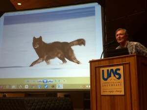 Nick Jans speaks about Romeo the wolf during the University of Alaska Southeast’s Evening at Egan lecture series. (Photo courtesy Katie Bausler/UAS)