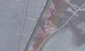 This tank farm (center) has already been relocated. The yellow line shows the projected shoreline in 2035, by which time Port Heiden's Goldfish Lake (at right) will likely be a part of the Bay.