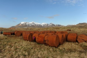 Abandoned tanks on Attu Island are inventoried as the US Fish and Wildlife Service research boat R/V Tiglax stops at the western most of the Aleutian Islands on Wednesday, June 3, 2015. (Bob Hallinen / Alaska Dispatch News)
