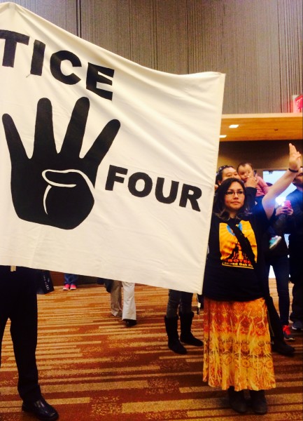 As an evidentiary hearing for the Fairbanks Four is underway, protesters make sure the men aren't forgotten at the AFN convention in Anchorage. Photo: Daysha Eaton/KBBI.