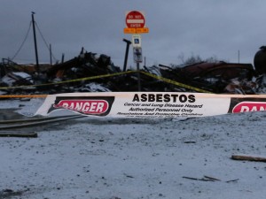 Asbestos warnings surrounding the KIlbuck campus. (Photo by Dean Swope/KYUK)