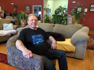Chanlyut director Bill Tsurnos sits in the living room of the residential re-education program. Hillman/KSKA