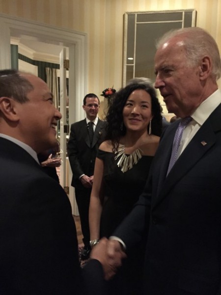 Crystal Worl looks on as her father Rodney Worl shakes hands with Joe Biden. (Photo courtesy Crystal Worl)