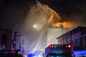 Capital City Fire and Rescue spent the night of Nov. 5 fighting a blaze at the Gastineau Apartments in downtown Juneau. (Photo by Heather Bryant/KTOO) Firefighters battle blaze downtown