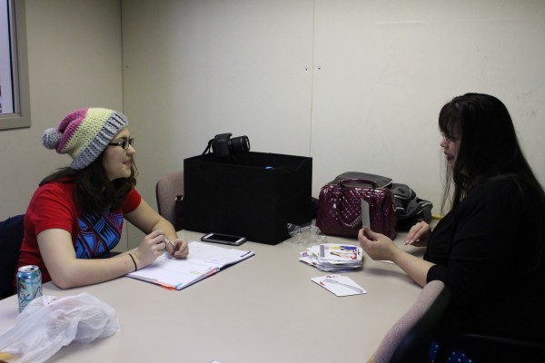 Emily Rose Edenshaw-Chafin and Susie Lee Edwardson plan out their next YouTube video. (Photo by Elizabeth Jenkins/KTOO)