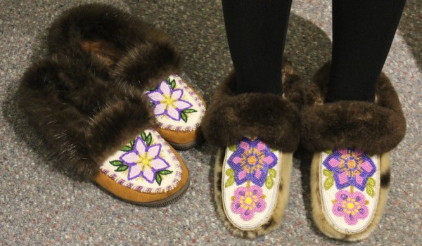 Two pairs of moccasins Crystal Nelson has worn for Rock Your Mocs 2015. (Photo by David Purdy/KTOO)