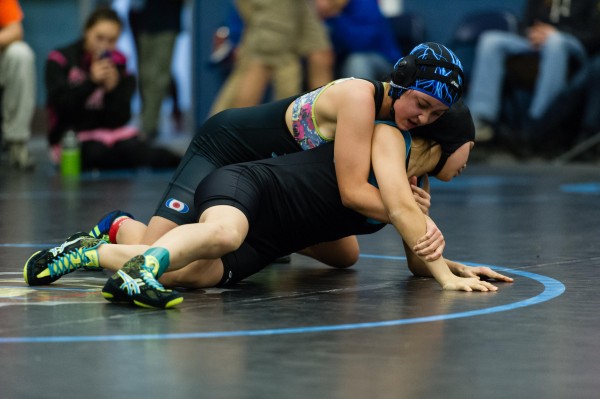Dillingham's Cate Gomez with an upper hand on Johanna Bell from Scammon Bay. Gomez placed second at regionals, but found out Sunday night she'll get to go to state next weekend too. CREDIT KEVIN TENNYSON. Shared via KDLG.org.