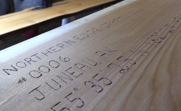 Furniture from Northern Edge Craftworks is marked with the GPS coordinates of the tree it came from. (Photo by David Purdy/KTOO)