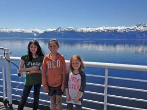 Children pose during an Alaska Marine Highway trip in Southeast Alaska. New rules for children traveling alone remain on hold, officials say. (Photo courtesy AMHS)