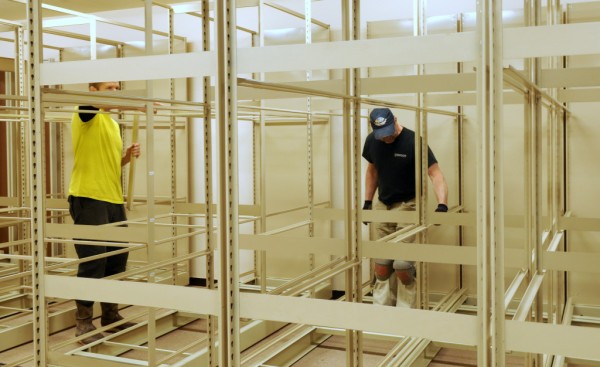 Dawson Construction employees assemble a maze of framing on Monday at the Sheldon Museum. (Jillian Rogers)
