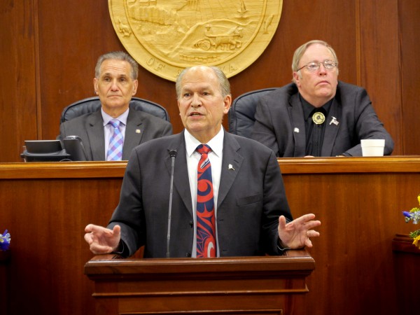 Alaska Gov. Bill Walker delivers his annual State of the State Address to the legislature, Jan. 21, 2016. Behind him (left to right) are Senate President Kevin Meyer and Speaker of the House Mike Chenault. (Photo by Skip Gray/360 North)