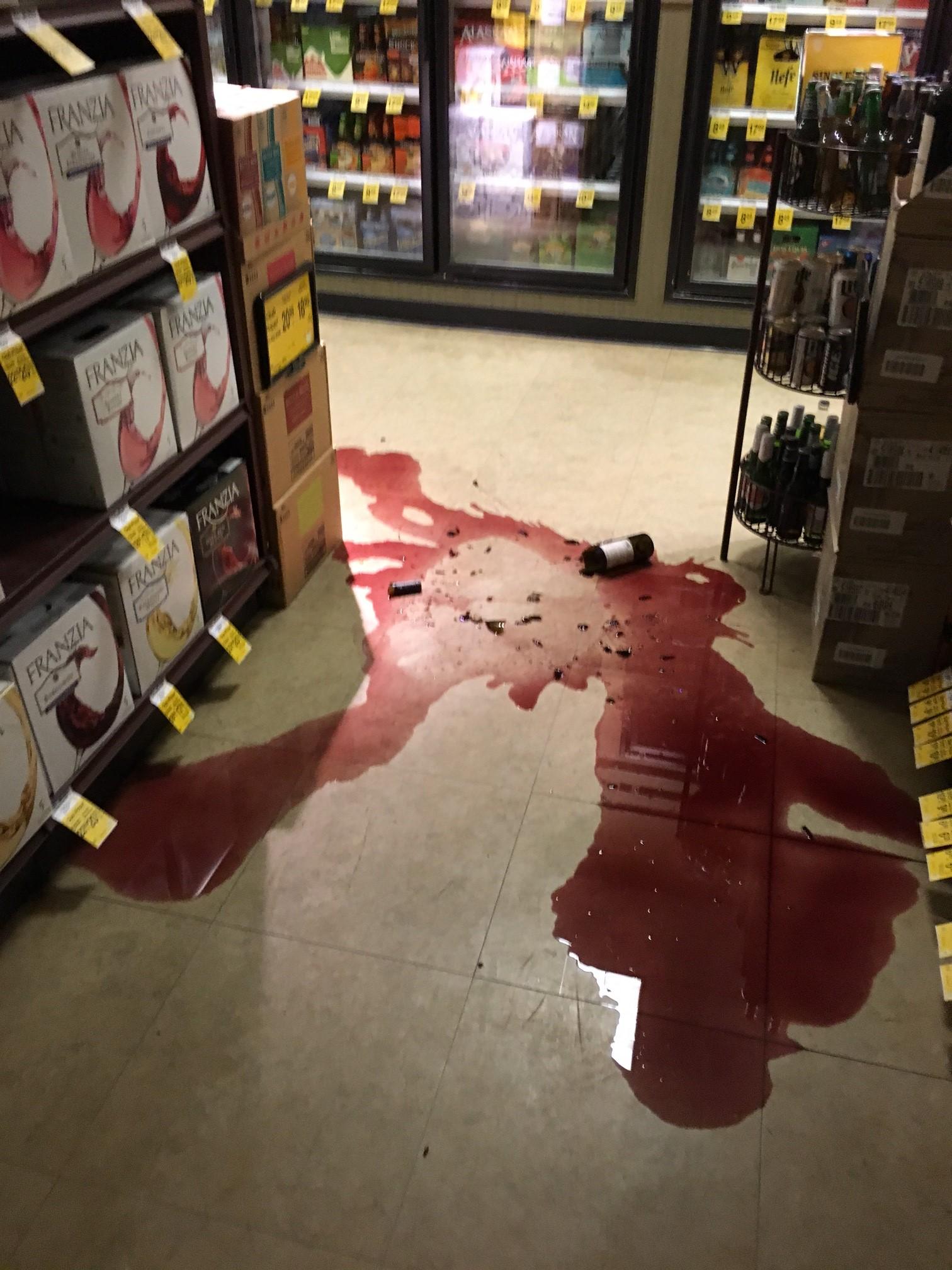 Broken wine bottle in Safeway liquor store (Photo By Perry Lynn, Carrs/Safeway Grocery Manager)
