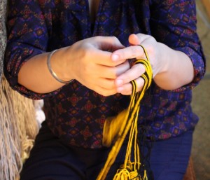Lily Hope dyed the yellow yarn herself. She was worried about it turning out orange, but it transformed into the “perfect Chilkat yellow.” (Photo by Elizabeth Jenkins/KTOO)