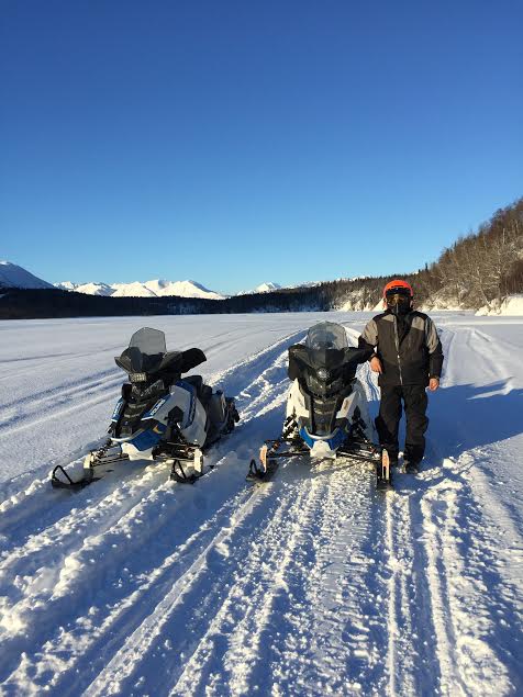 Joe Cleaver and the team's snowmachines on a recent training run near Puntilla Lake. (Photo courtesy of Bobby Frankson)