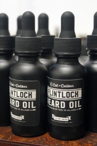 Newly-labeled bottles of Flintlock beard oil. (Photo by Josh Edge)