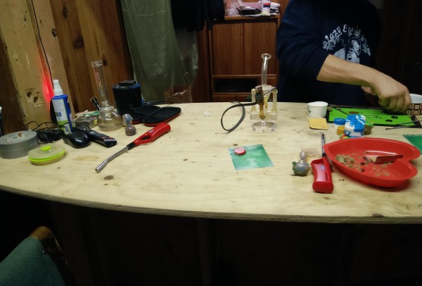 Counter holding marijuana and tools. (Photo by Quinton Chandler/KBBI)