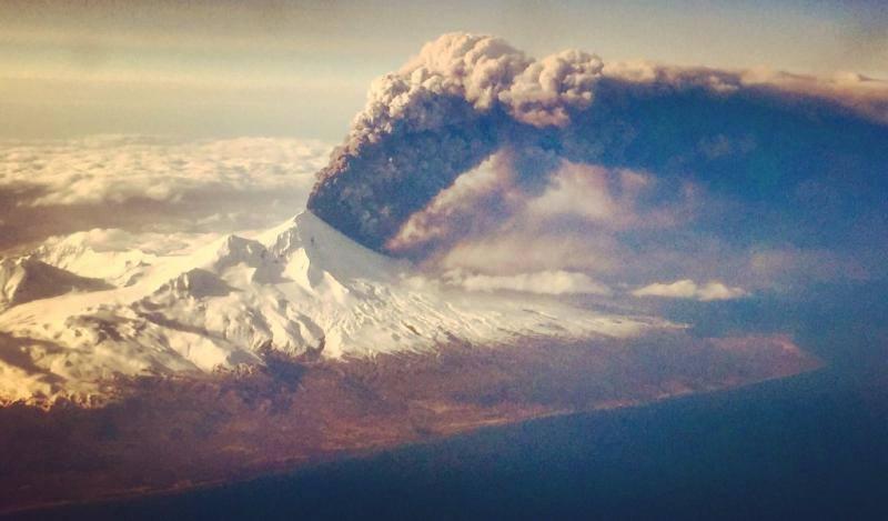 Pavlof volcano in eruption, March 27, 2016. (Photo courtesy of Colt Snapp, taken from a flight enroute to Anchorage, from Dutch Harbor)
