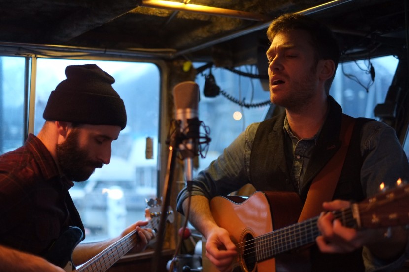 Dan DeSloover and Dan Kirkwood perform on the F/V Arete as part of their Tiny Desk Contest submission. (Photo by Annie Bartholomew, KTOO - Juneau)