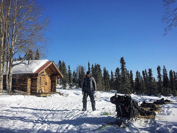 Brent Sass along the Iditarod trail on Saturday. (Photo by Emily Schwing/KNOM)