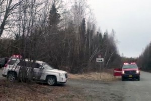 Emergency vehicles near the scene of a plane crash in Birchwood on April 20, 2016. (Photo by Ellen Lockyer/Alaska Public Media)