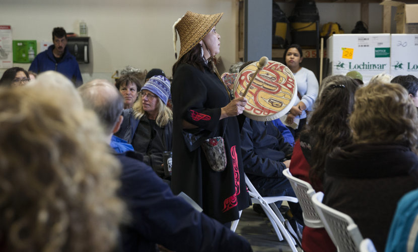 Nancy Barnes sings during a groundbreaking ceremony for a homeless housing facility on Monday May 16, 2016 in Juneau, Alaska. The Juneau Housing First Collaborative is overseeing the project which will put a 32-unit facility in place. Barnes and others in a multicultural Yees Ku Oo dance group performed on the construction site as part of the celebration. (Photo by Rashah McChesney, KTOO - Juneau)