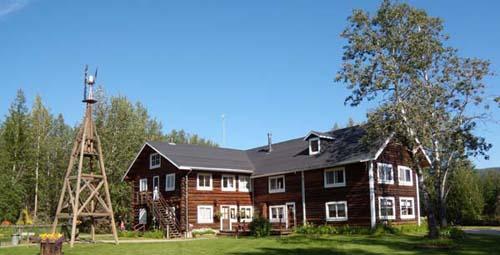 Rika's Landing, a restored roadhouse, serves as the Big Delta State Historical Park's main attraction. State Parks shored-up about 300 feet of the Tanana River's south bank 10 years ago to halt erosion that could eventually have threatened Rika's. (Photo courtesy of Alaska Department of Natural Resources)