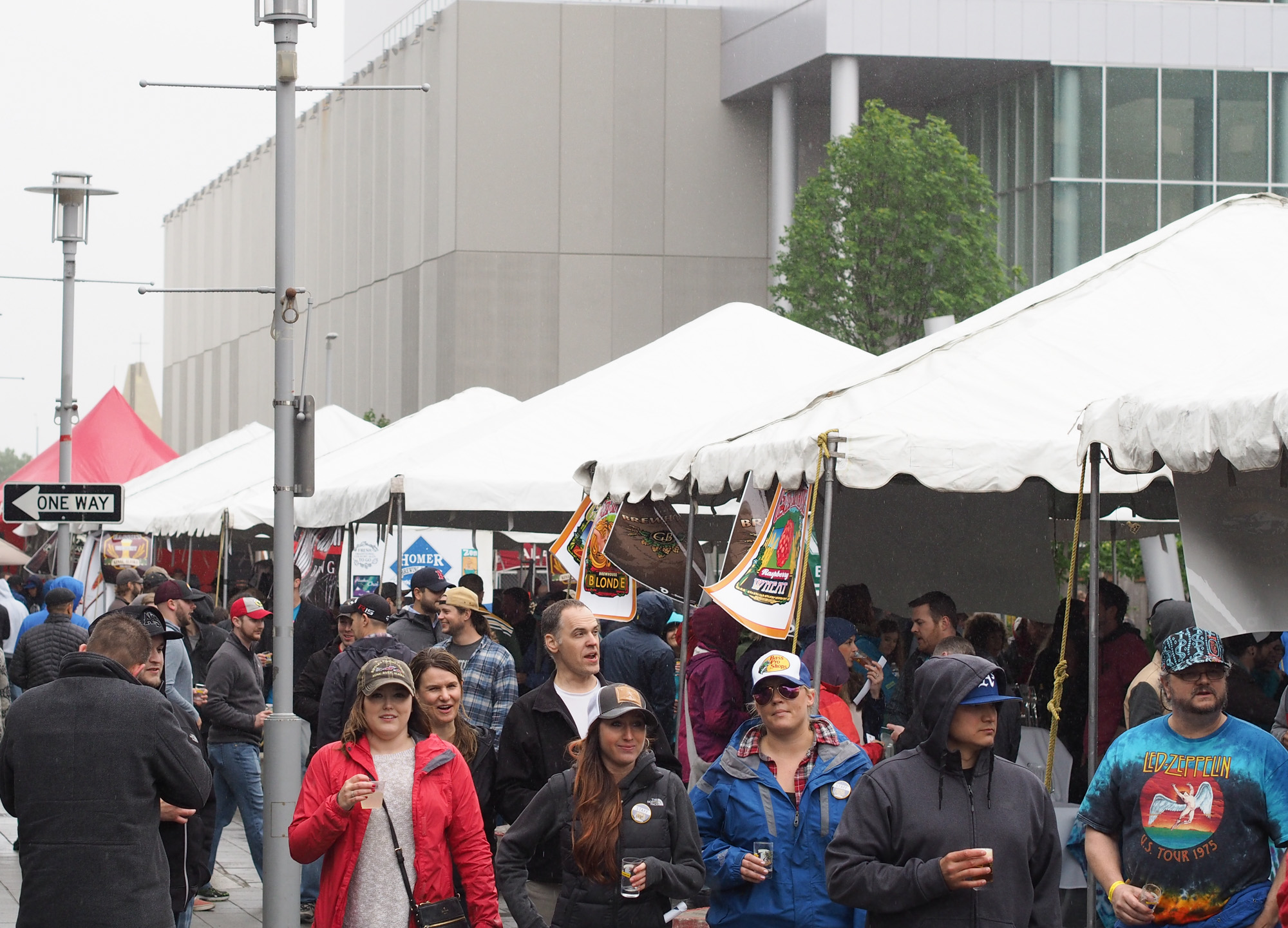 Patrons at the Alaska Crafted Festival visiting beer tents during the Saturday event in downtown Anchorage. (Photo by Zachariah Hughes, Alaska Public Media - Anchorage)
