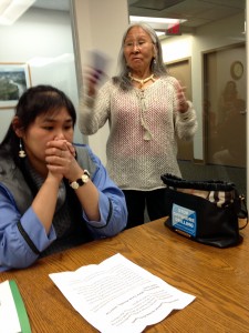 Point Lay tribal council member Cilia Attungowruk, left, and tribal President Marie Tracey met with reporters at the office of the Alaska Wilderness League. Photo: Liz Ruskin/APRN.
