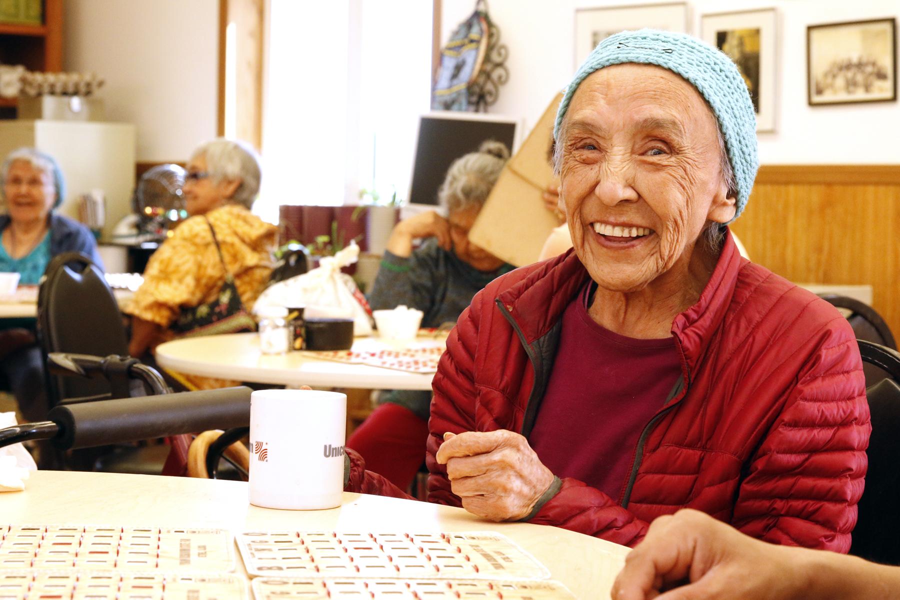 Catherine Peters, age 82, playing bingo at the ONC Senior Center. (Photo by Dean Swope, KYUK - Bethel)