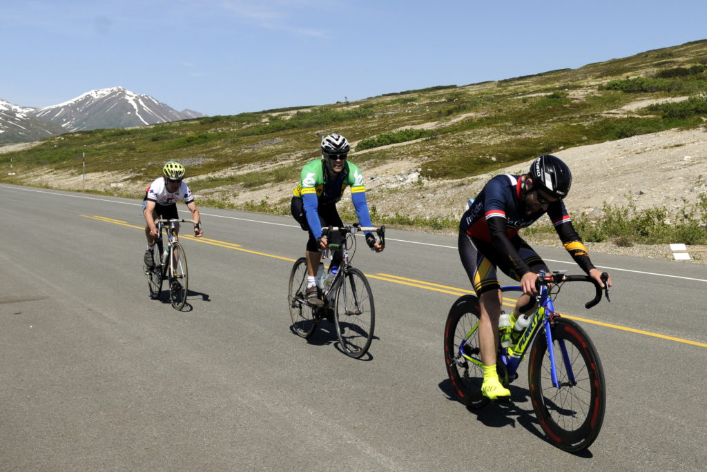A pack of riders make their way past the summit checkpoint during Saturday’s Kluane-Chilkat International Bike Relay. (Photo by Jillian Rogers, KHNS -Haines)