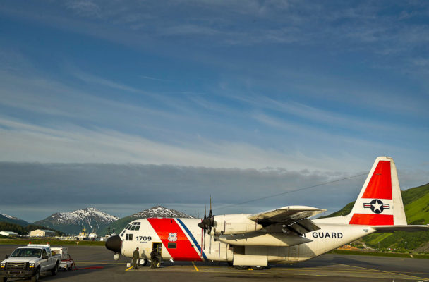 U.S. Coast Guardsmen conduct preflight checks on a Coast Guard HC-130H Hercules on the flight line June 28, 2012 Coast Guard Air Station Kodiak, Alaska. Coast Guardsmen from Air Station Kodiak are flying daily missions to Barrow, Alaska in preparation for a U.S. Coast Guard deployment Arctic Shield. Arctic Shield is a forward deployed temporary air station operating from Barrow in the Arctic Ocean during the summer to increase search and rescue response times in the region. (Department of Defense photo by U.S. Air Force Tech. Sgt. Michael R. Holzworth/Released)