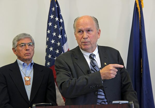 Gov. Bill Walker spoke to reporters on June 29, announcing his budget vetos, including a $1,000 cap on the PFD. Photo: Rachel Waldholz/APRN