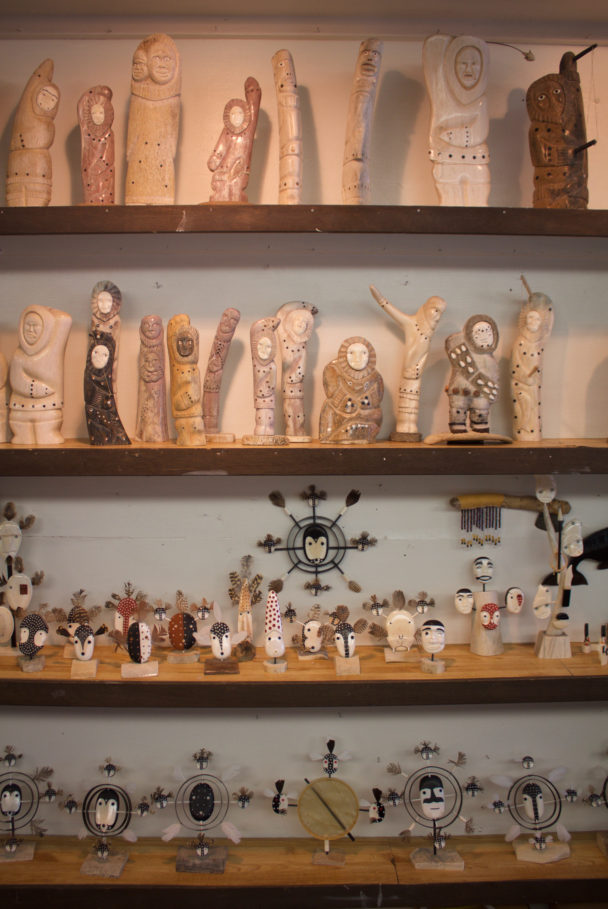 Ivory carvings and masks on display at Maruskiya’s in Nome. (Photo by Emily Russell, KNOM)
