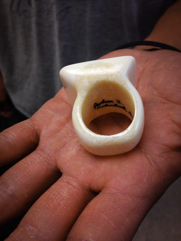 Ivory ring carved and signed by King Island carver John I. Kokuluk. (Photo by Emily Russell, KNOM - Nome)
