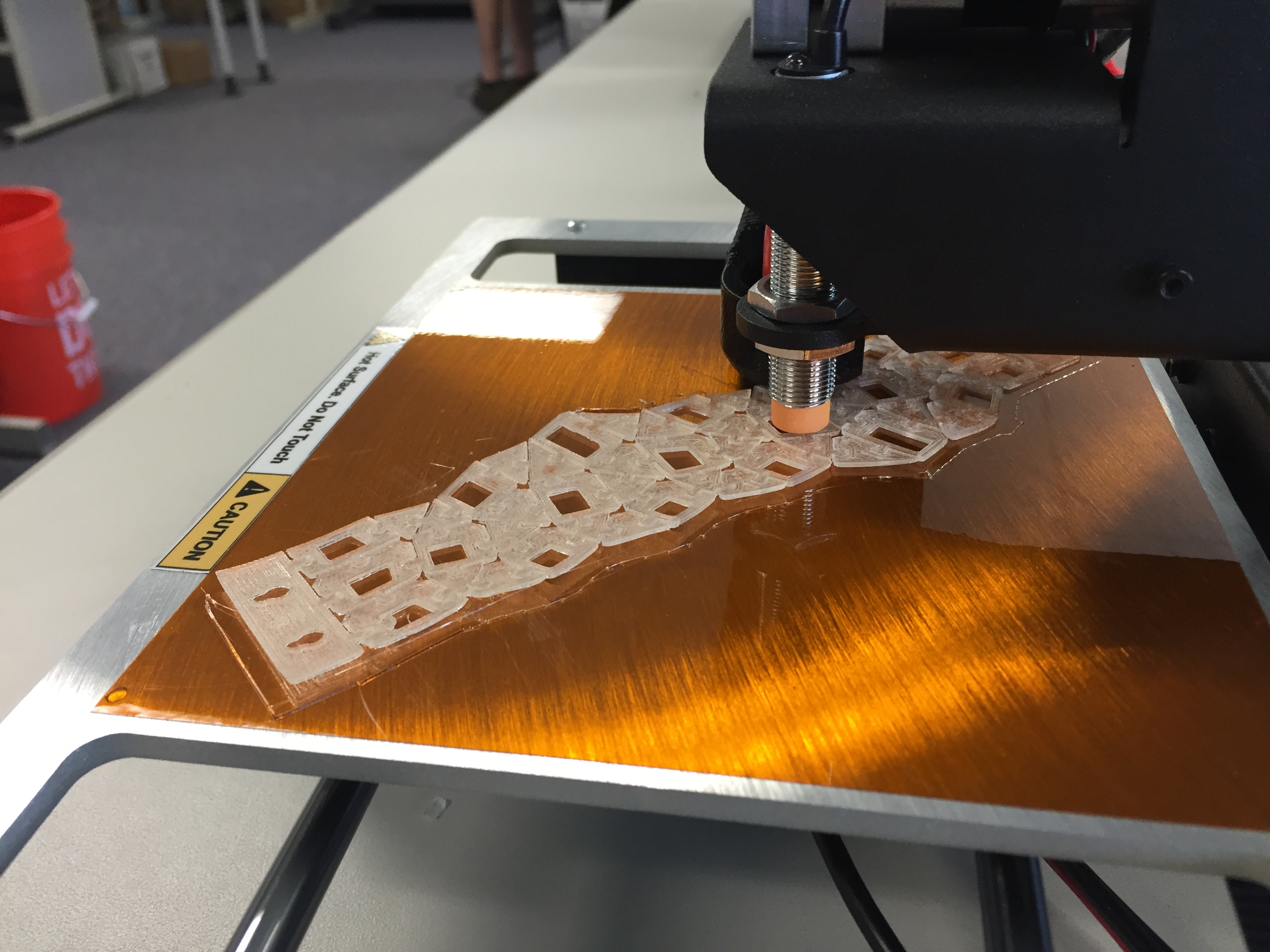 A 3-D printer creating a design (Photo by Robyne, KUAC - Fairbanks)