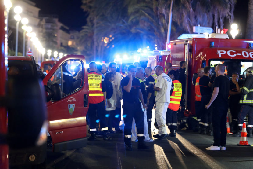 Police officers, firefighters and rescue workers at the Promenade des Anglais in Nice after a truck drove into a crowd watching a fireworks display in the French Riviera resort. (Photo by Valery Hache/AFP/Getty Images)