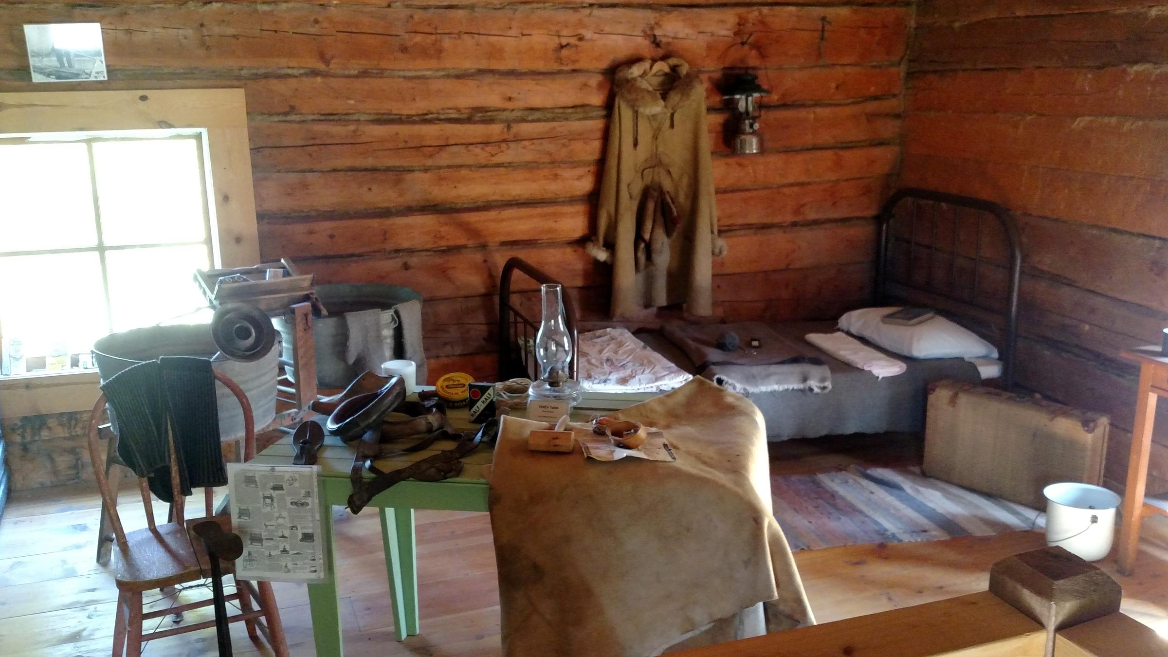 The living quarters cabin, like other historic buildings at the park, contains furniture from the period when Signal soldiers operated the telegraph station that was part of the old Washington-Alaska Military Cable and Telegraph System. (Photo by Tim Ellis, KUAC - Fairbanks)
