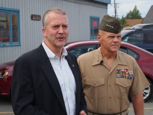 Sen. Dan Sullivan and Gen. Robert Neller talking with reporters before an event at a VFW post in Mountain View. (Photo: Ben Matheson, Anchorage)