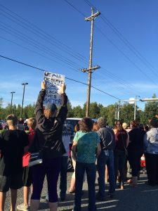 People way signs in midtown Anchorage in support of Black Lives Matter. (Hillman/Alaska Public Media)