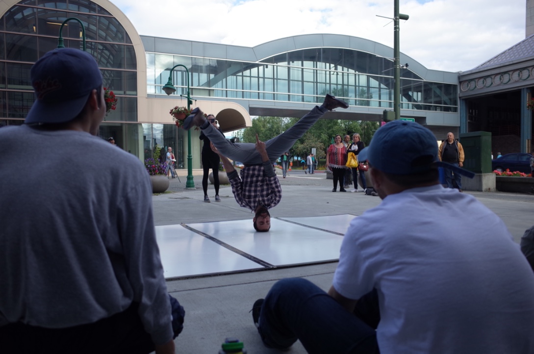 A spectator decides to join the breakdancers (Photo by Ammon Swenson, Alaska Public Media - Anchorage)