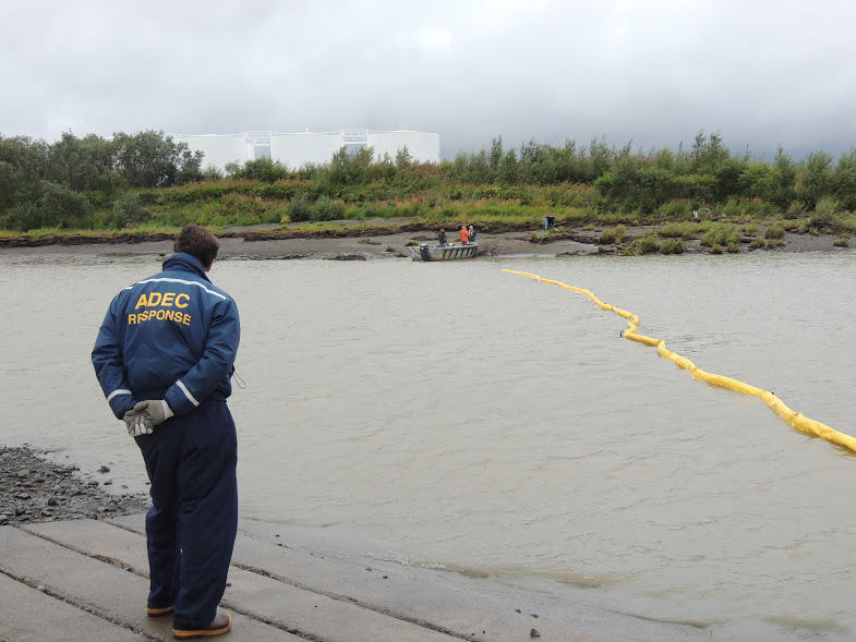 Containment boom is stretched across the entrance to Dillingham harbor Tuesday during oil spill response training exercises. (Photo by Shaylon Cochran, KDLG - Dillingham)