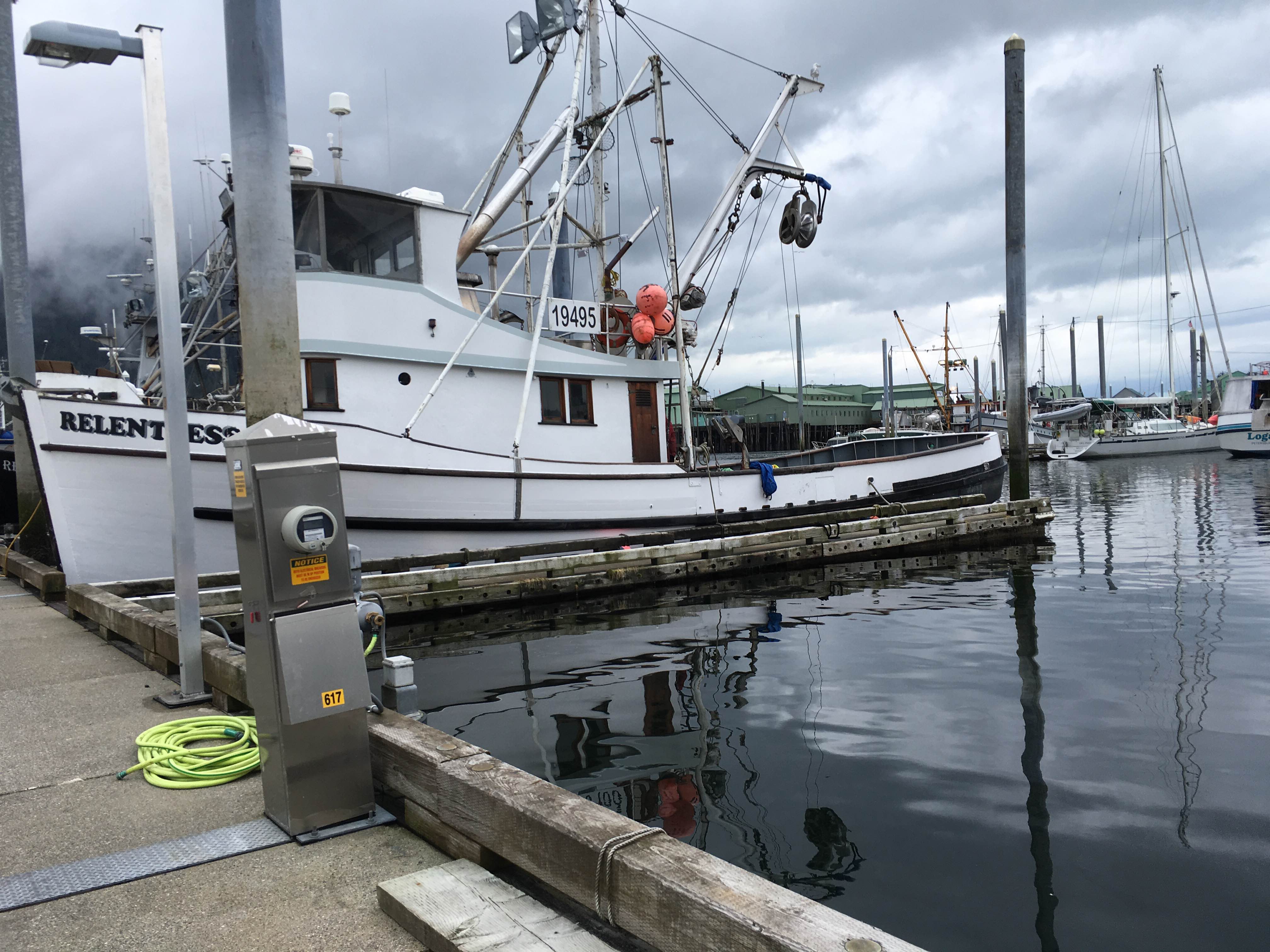 The F/V Relentless docked in Petersburg’s South Harbor and the crew removed their net. (Photo by Abbey Collins, KFSK - Petersburg)