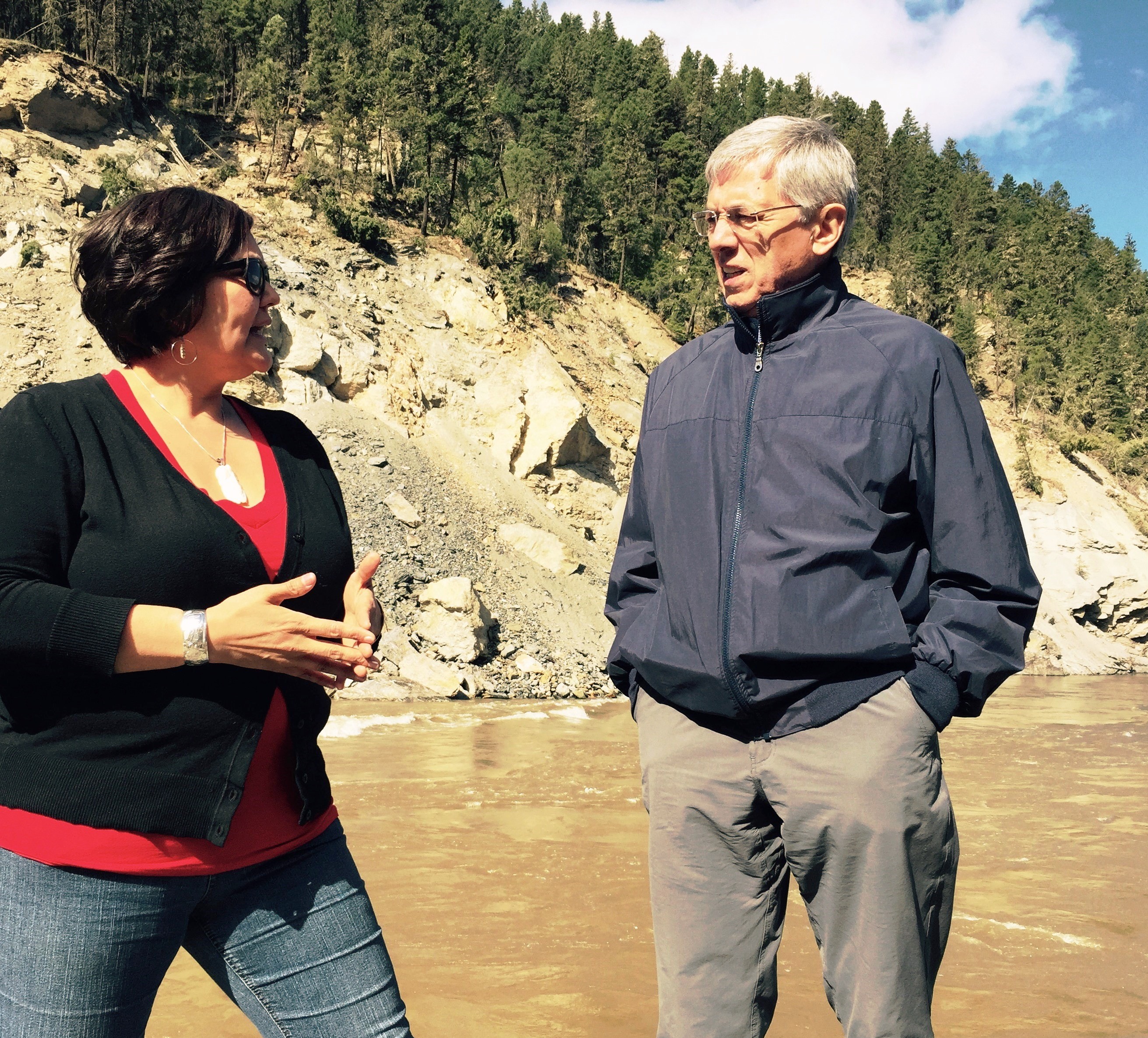 Lt. Gov. Byron Mallott discusses mine pollution concerns with Xat’sull tribal official Jacinda Mack on May 6, 2015. (Photo courtesy Office of the Governor)
