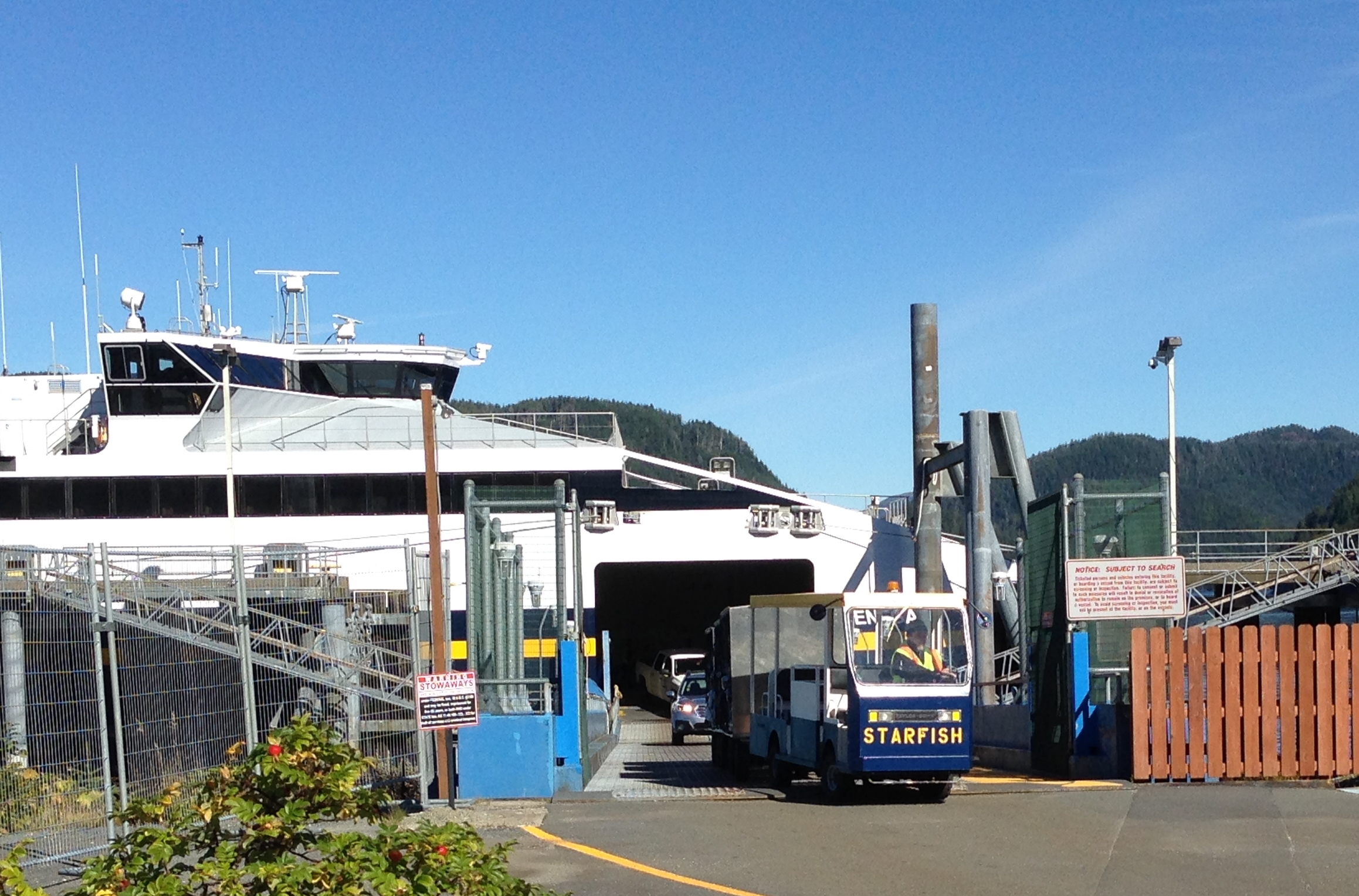 A baggage cart, nicknamed Starfish, leaves the Chenega in Sitka on Sept. 3, 2015. The fast ferry is tied up for the rest of this fiscal year. (Photo by Ed Schoenfeld, CoastAlaska News - Juneau)