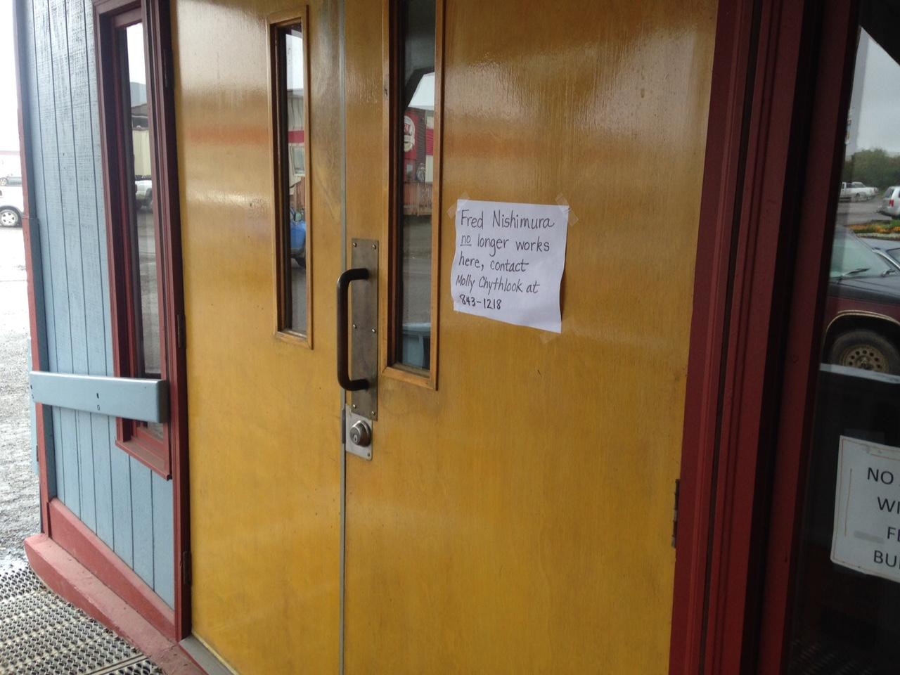 A sign posted on the door of the Aleknagik building in downtown Dillingham, where the ANL office is located. (Photo by KDLG - Dillingham)