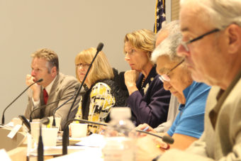 Lawmakers from the House and Senate Natural Resources Committees listened to testimony on Aug. 25, 2016. From left: Sen. Mike Dunleavy, R-Wasilla; Sen. Anna MacKinnon, R-Eagle River; Sen. Cathy Giessel, R-Anchorage; Rep. Dave Talerico, R-Healy; Rep. Benjamin Nageak, D-Barrow; and Rep. Bob Herron, D-Bethel. (Photo by Rachel Waldholz, Alaska’s Energy Desk - Anchorage)