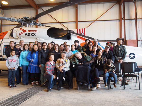 Members of the Schaeffer family pose for a picture after the dedication ceremony. (Photo: Zachariah Hughes, Alaska Public Media - Kotzebue)